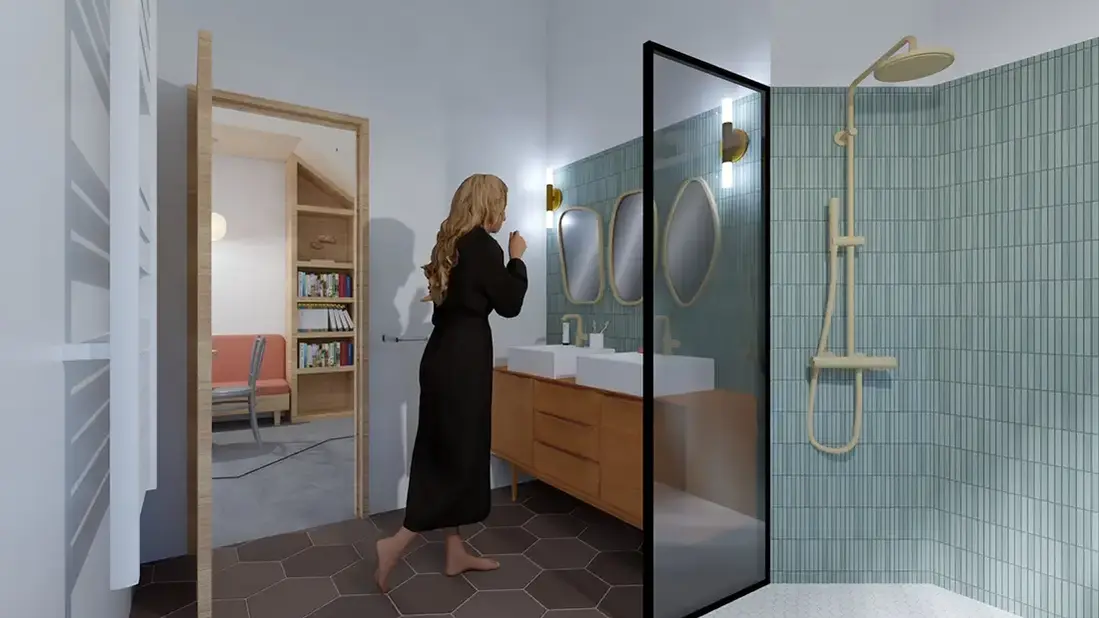 Une femme dans une salle de bains avec evier double vasque et douche italienne