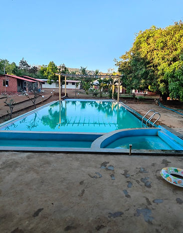 Swimming Pool Rain Dance at Resort in Shrivardhan