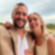 The couple behind WEDCO, smiling together at a wedding-inspired shoot