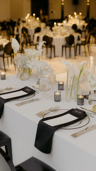 Black and white themed wedding with minimal white florals