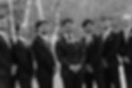 Black and white image of groom and Groomsmen