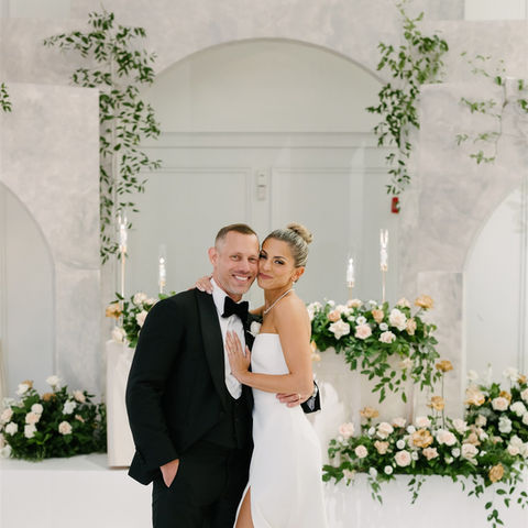 Couple in front of head table 