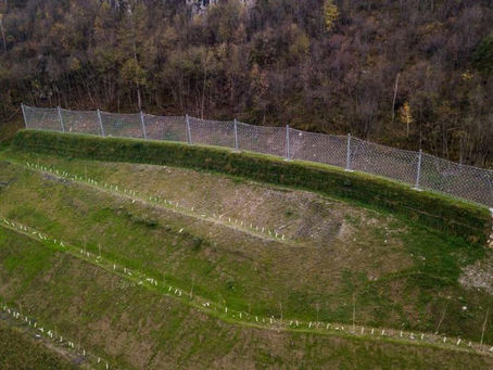 Technical paper: Framework for optimised design of rockfall protection embankments reinforced with g