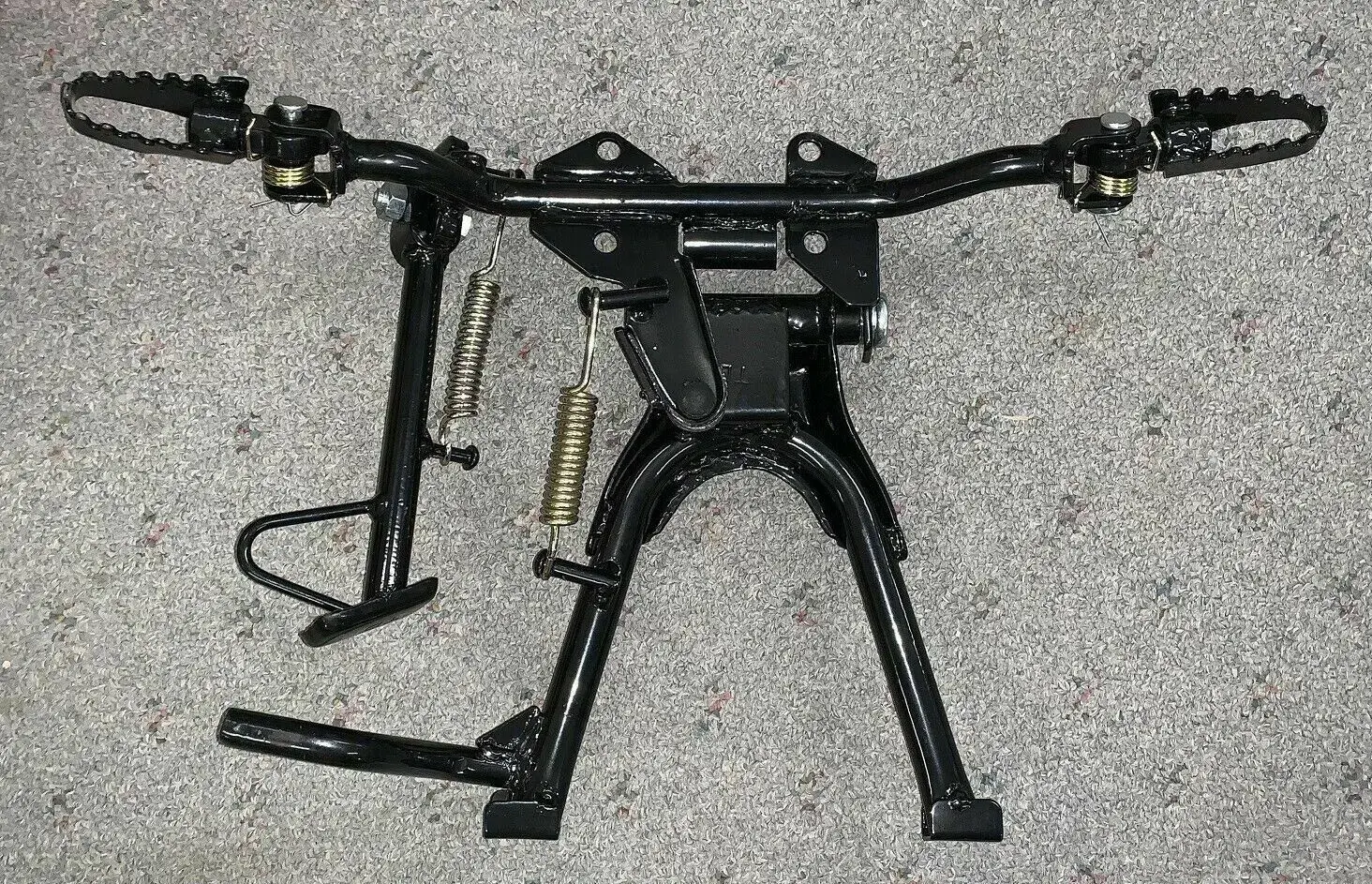 1003S  FOOT PEG MOUNT BRACKET KICK SIDE CENTER STAND ASSEMBLEY CT70 CT 70 TRAIL