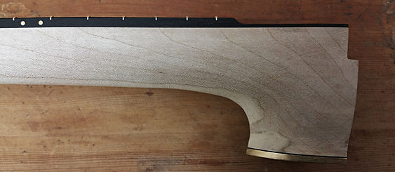 Darkwood-carved sycomore banjo neck with brass heal cap