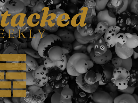 The Stacked newsletter header with plastic ducks on the background.