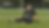 A Goalkeeper sitting on the floor.