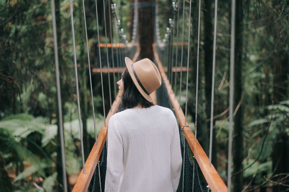 Woman On Suspension Bridge
