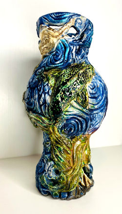 Tall fish vase