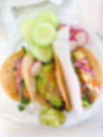 baja fish tacos with fresh raw radish and cabbage