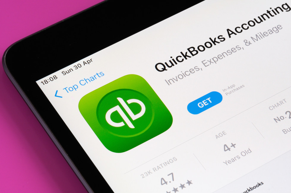 a tablet showing QuickBooks Accounting App