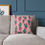 Thumbnail: Pink cactus cushion on sofa