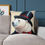 Thumbnail: Polar bear wearing a top hat and bow tie on a cushion