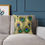Thumbnail: Peacock feather cushion on beige sofa