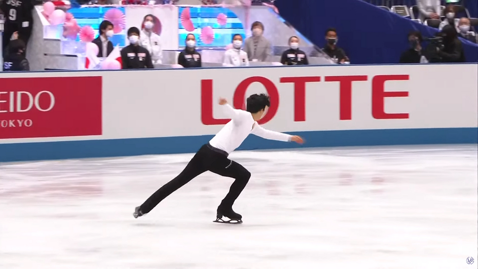 Nathan Chen, from the United States of America, is the 2022 Olympic Champion. He performs a quad-toe loop jump.