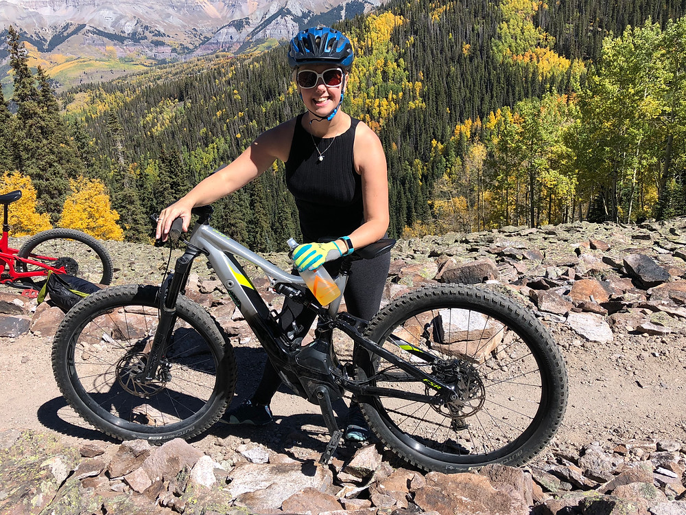 Lyn with mountain eBike. View in background