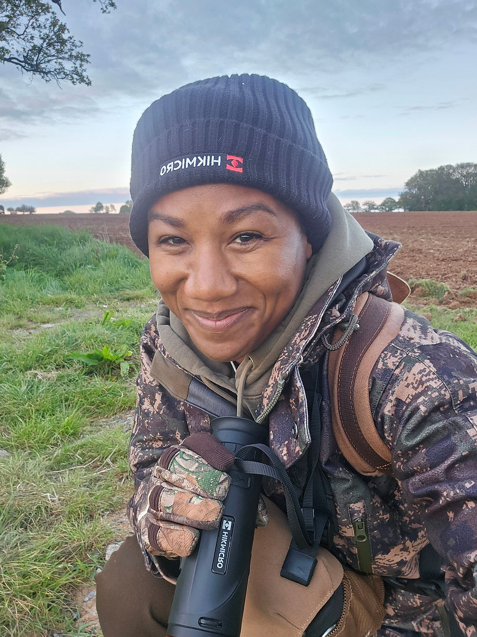 Shooting girl with an afro Nicole Moore deer stalking with HikMicro