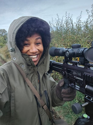 Shooting girl with an afro hik micro alpex scope   - pest control Derbyshire