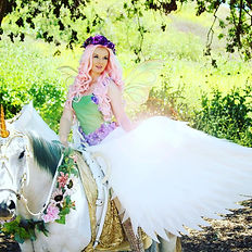 A horse dressed as an alicorn.