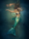 A woman YouTuber learning how to swim in a mermaid tail in Ventura County