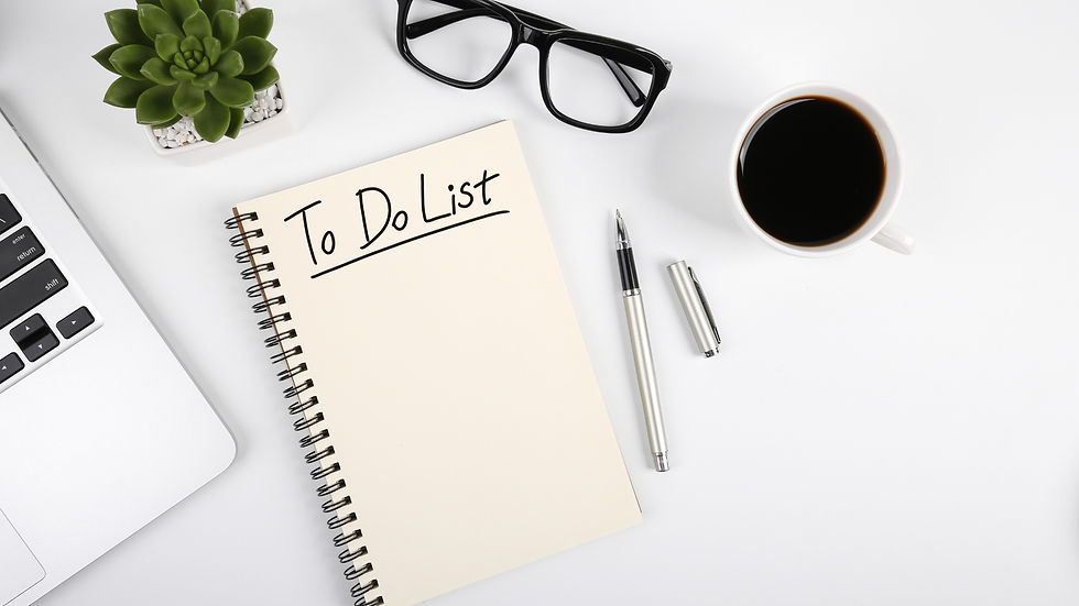 to do list, notebook on desk with glasses & a cup of coffee