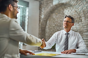 happy-manager-handshaking-with-candidate-after-successful-job-interview-office.jpg