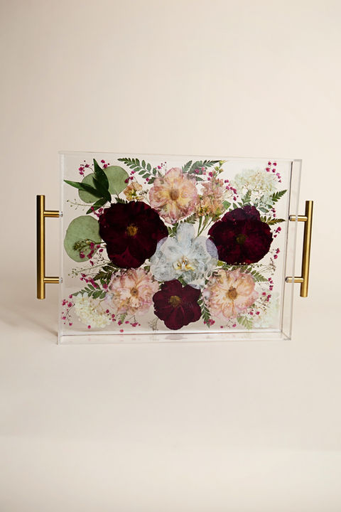 Floral tray with gold handles, flowers arranged, elegant design, home decor piece.