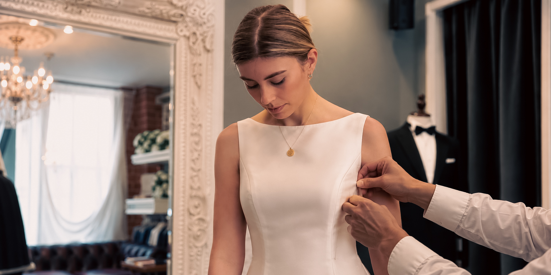 Elegant white dress undergoing a professional garment fitting at Perth Tailoring Co