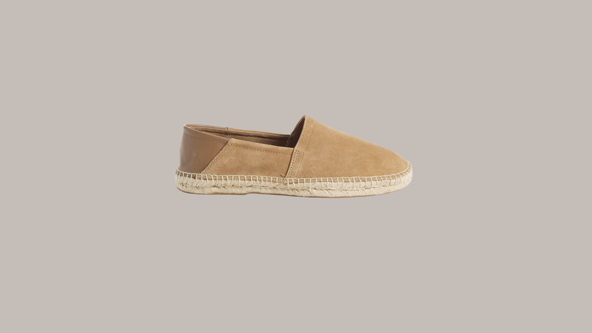 Brown suede slip-on summer shoes with woven jute soles inspired by Jeremiah Brent's relaxed Portugal style.