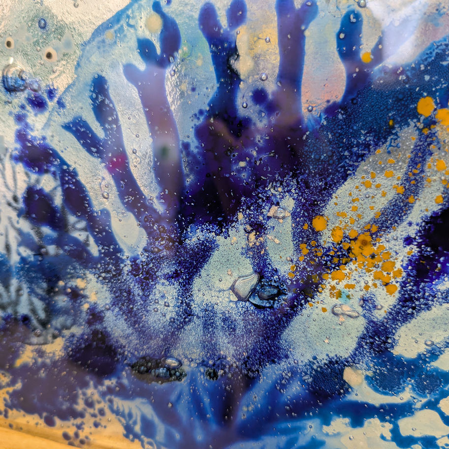 Abstract blue art with varying shades and textures in an artistic form.