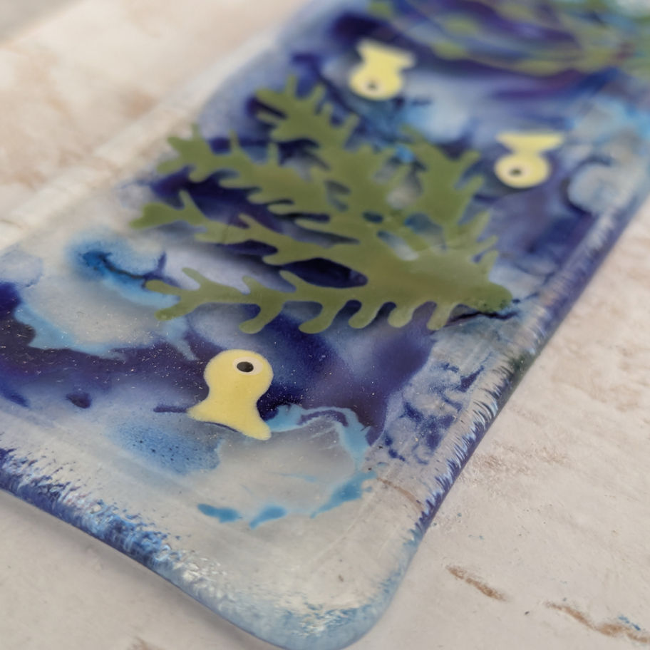 Abstract art of blue resin with seaweed and golden embellishments Tam's Glass