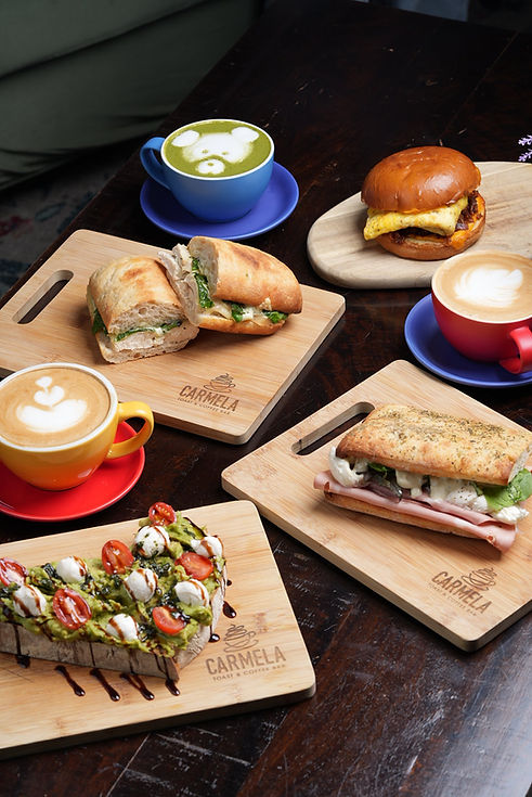 Avocado toast, breakfast sandwich, latte, and capucchino