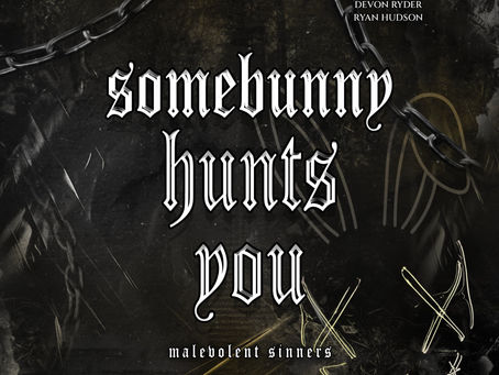 Chains and gothic text reading "Somebunny Hunts You" dominate a dark, eerie background. Performers and author listed. Mysterious and suspenseful mood.