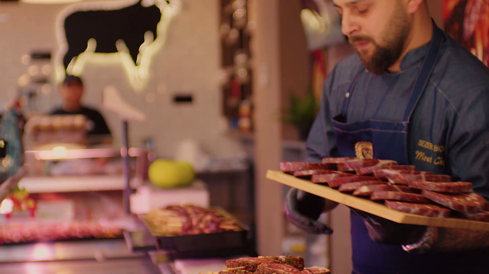 butcher-displays-spiced-meat-in-workplace-2025-12-17-20-26-10-utc.mov