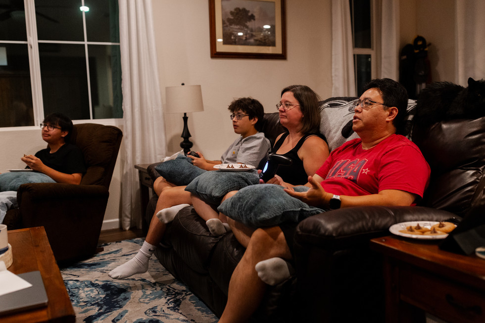 Family together on a couch