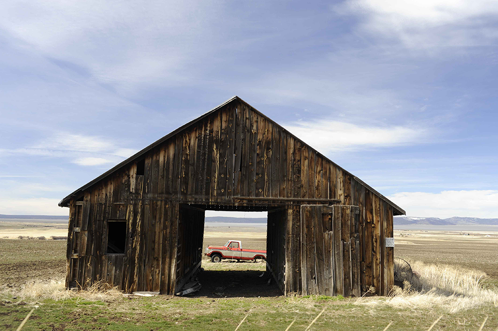 an old barn in the field