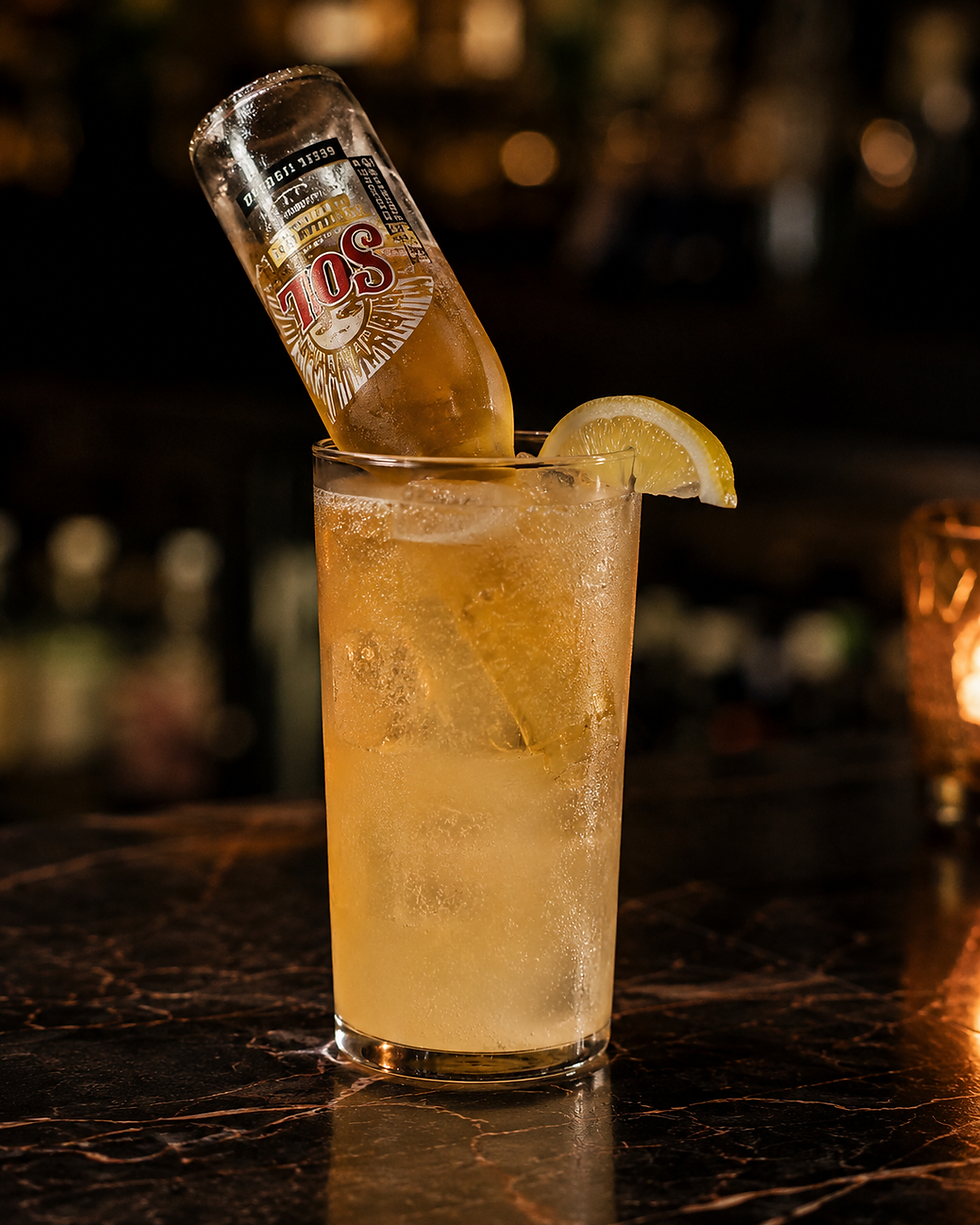 SOL beer cocktail with lemon at a Bar