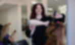 Student performing hands-on hair styling training at Steven Papageorge Hair Academy