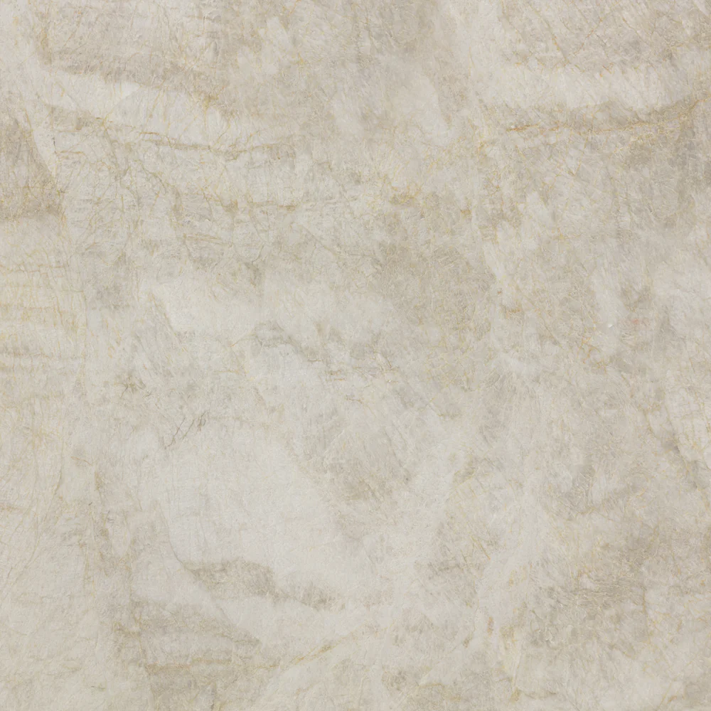 Light stone-look quartzite countertop sample with soft gray and beige veining.
