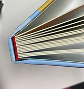 Board book binding designed for lay-flat books