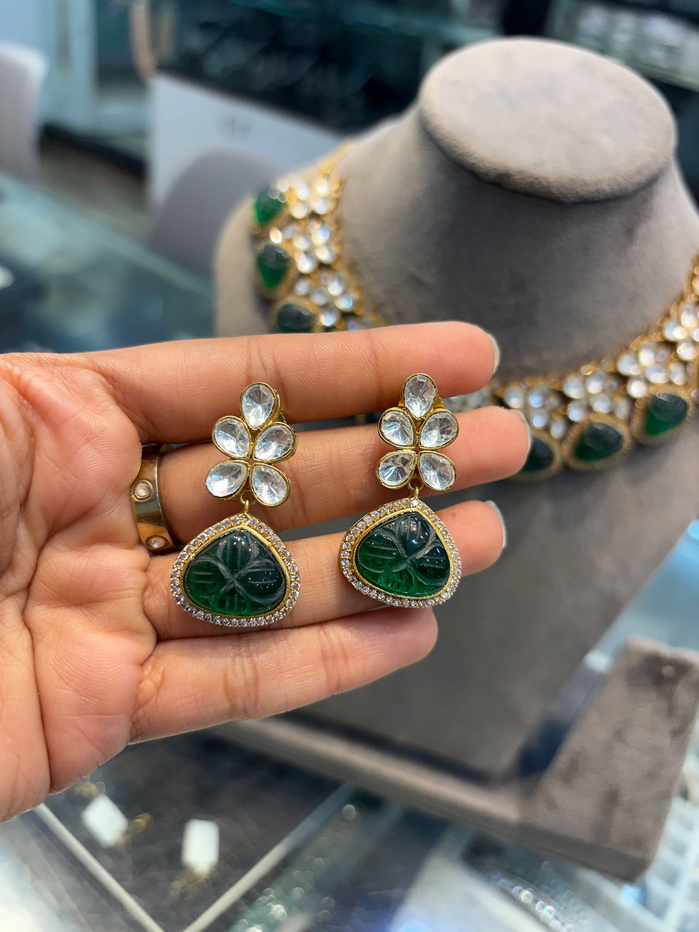 Thumbnail: Polki with green carved stone studded necklace with earrings 
