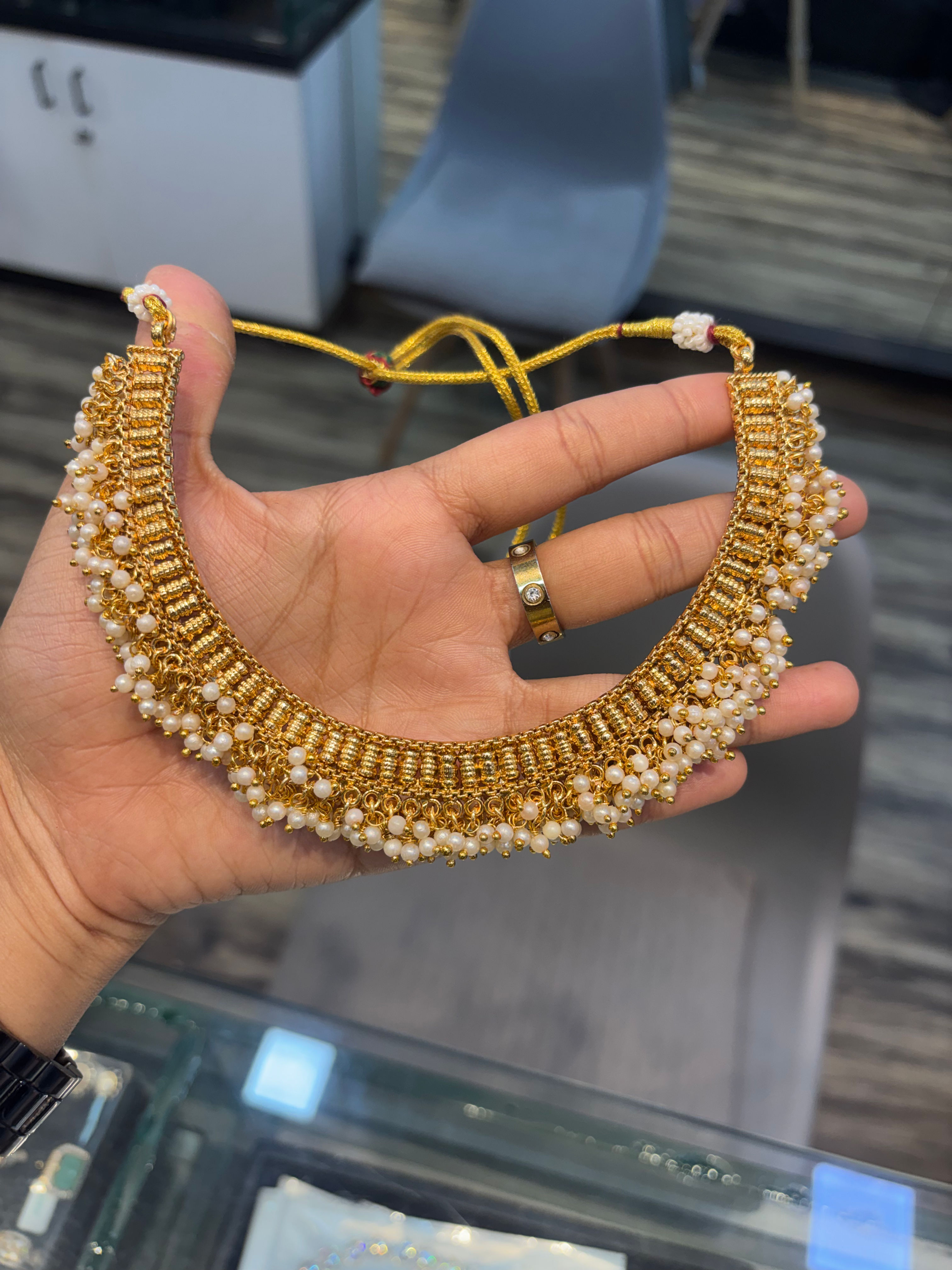 Pearl gold necklace with earrings and mang tika 