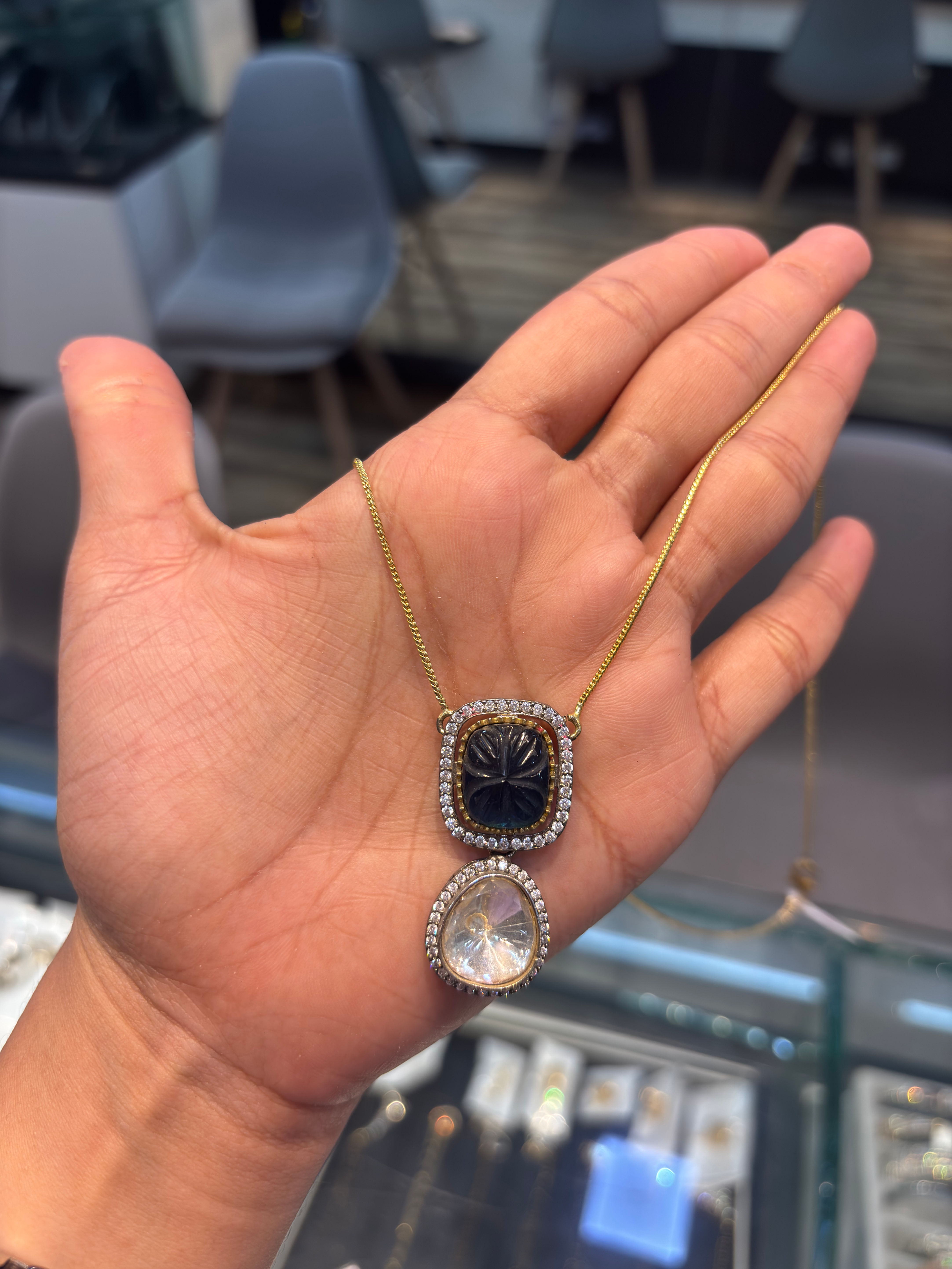 Blue carved stone uncut polki pendant with attached chain