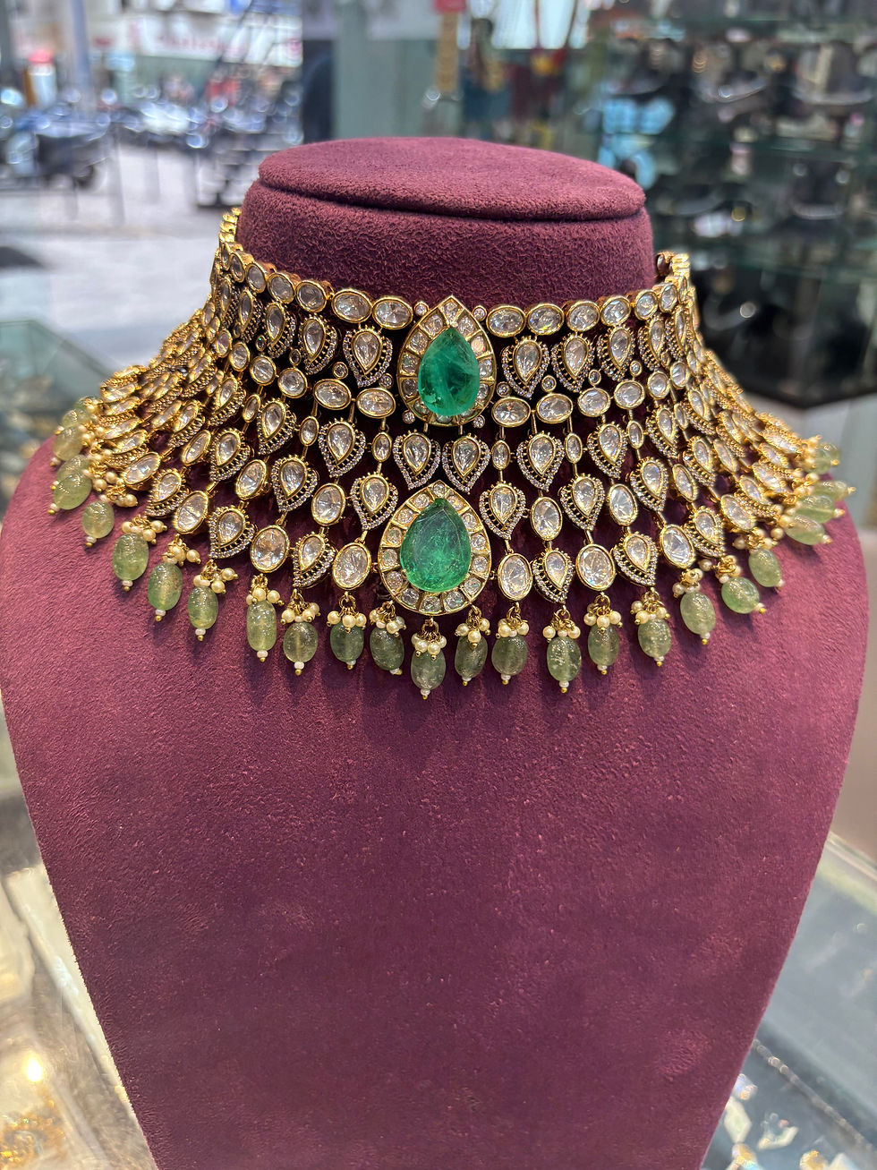 Thumbnail: Bridal green doublet studded polki choker necklace with earrings and mang tika  