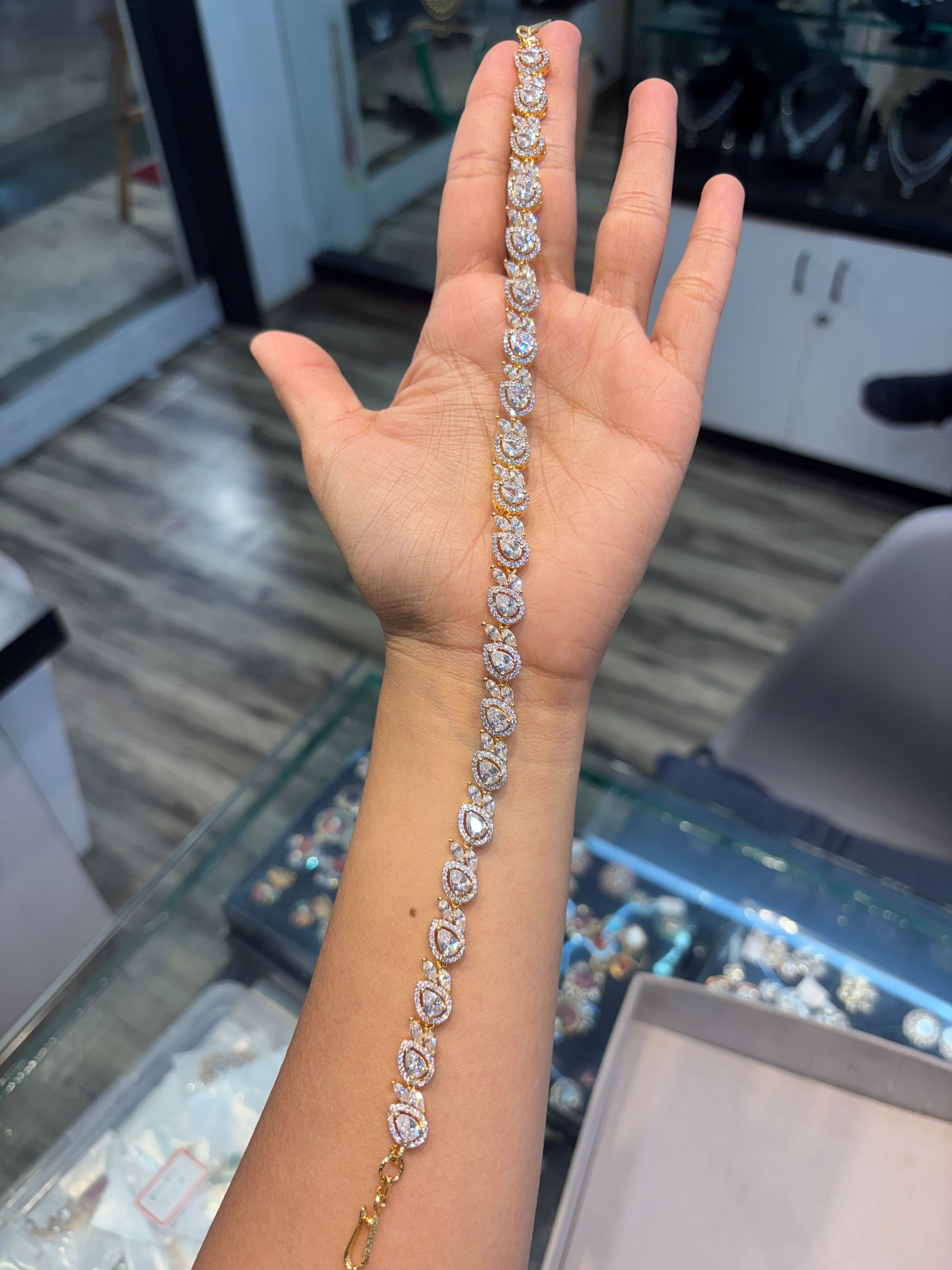 Diamond studded Shishphool - gold polish 