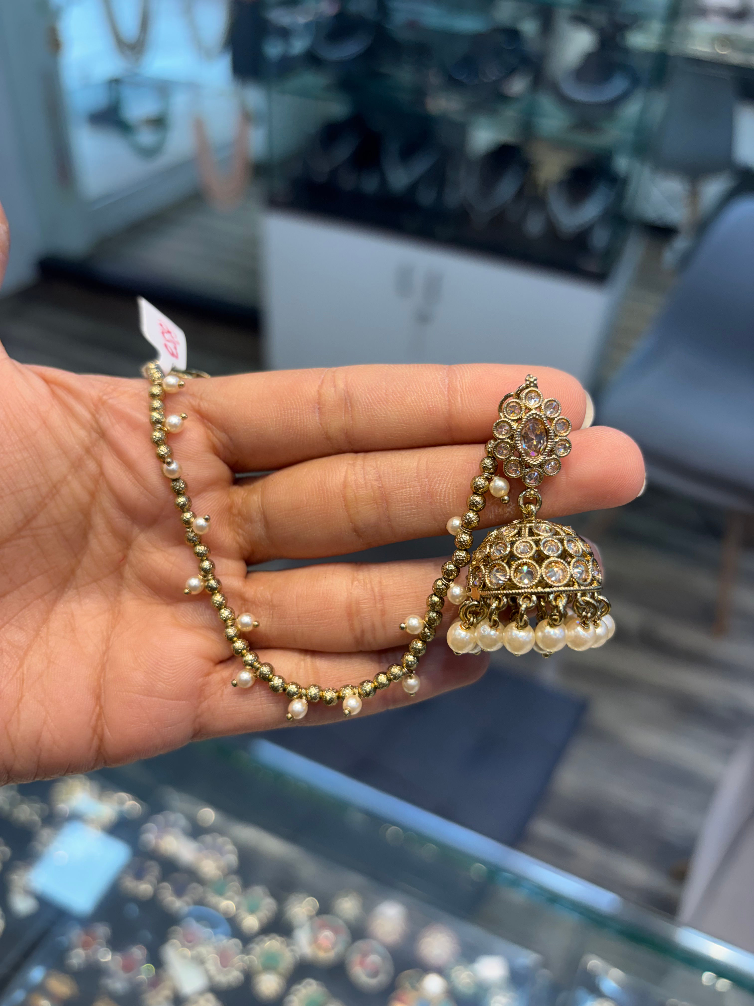 Antique jhumki earrings with attached ear chains in Victorian polish