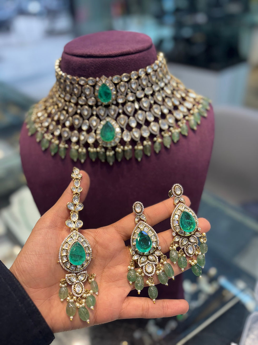 Thumbnail: Bridal green doublet studded polki choker necklace with earrings and mang tika  