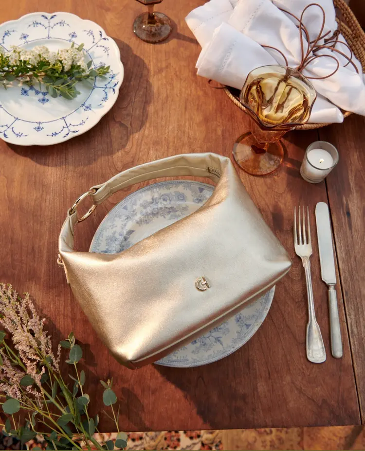 gold_handbag_stilllife_wedding_cole_haan