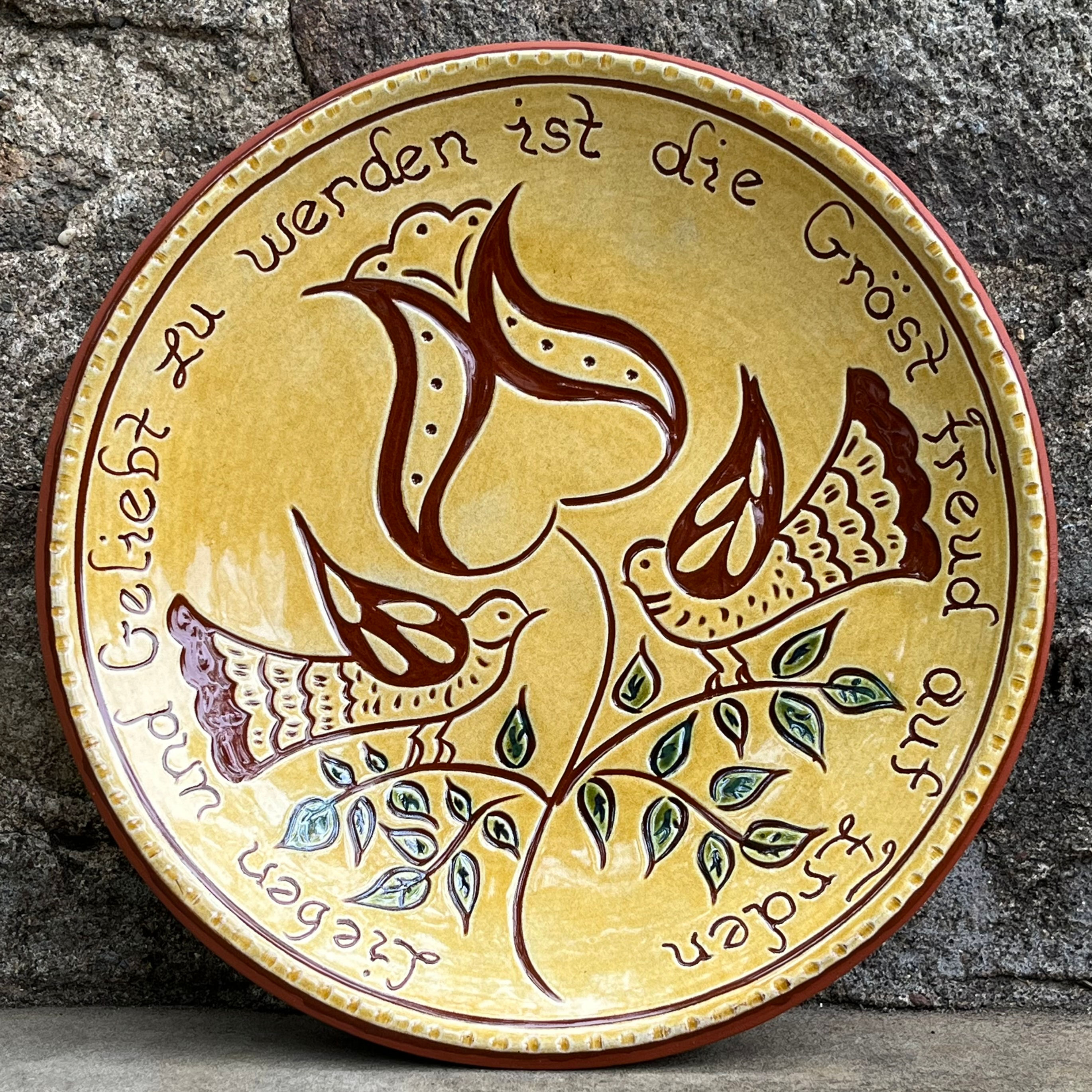 To love and be loved is the greatest joy on earth - Redware plate decorated with the sgraffito technique
