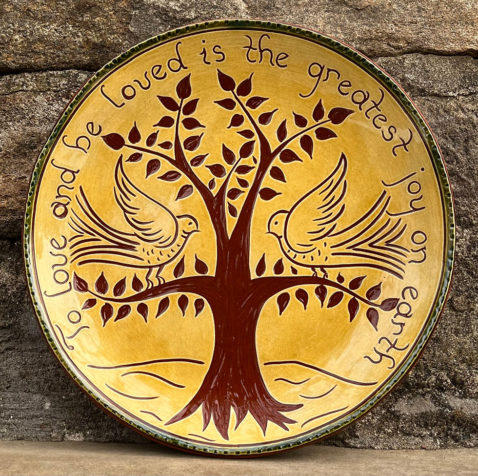 Pennsylvania Redware Dish made in a 1760 circa stone house decorated with the sgraffito technique of scratching